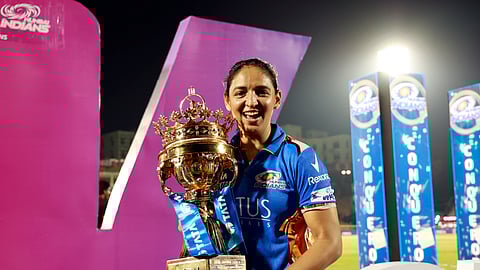 Mumbai Indians skipper Harmanpreet Kaur with WPL trophy