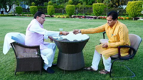 Uttarakhand Finance Minister Premchand Aggarwal submits his resignation letter to the Chief Minister Pushkar Singh Dhami.