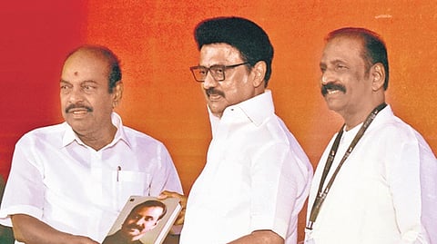 CM Stalin receiving the first copy of poet Vairamuthu’s collection of works during an event on Sunday