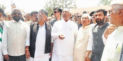 AICC president Mallikarjun Kharge with DyCM DK Shivakumar, Forest Minister Eshwar Khandre and Law Minister HK Patil in Gadag on Sunday.