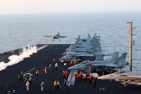 This image taken from video provided by the US Navy shows an aircraft launching from the USS Harry S Truman in the Red Sea before airstrikes in Sanaa, Yemen, Saturday, March 15, 2025.