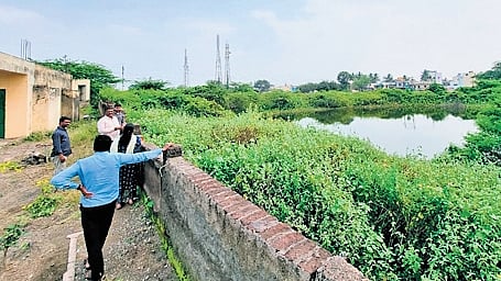 The issue with IAS officer Rajendra Kataria involved setting up a taluk office upon a lake.