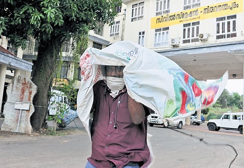 One of the employees attempts to escape the bee attack apparently triggered by a bomb squad inspection at the civil station on Tuesday