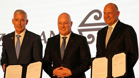 New Zealand Prime minister Christopher Luxon, center along with Air New Zealand CEO Greg Foran, left and Air India CEO Campbell Wilson at a MOU signing ceremony during the travel and tourism reception organized by New Zealand tourism in Mumbai.