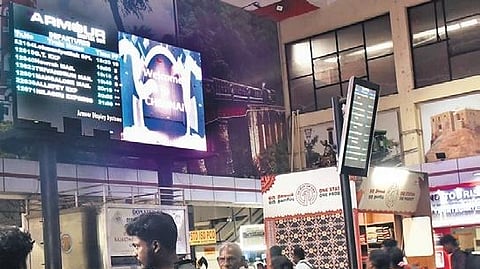 A digital display board with arrival and departure of trains used for representational purposes only.