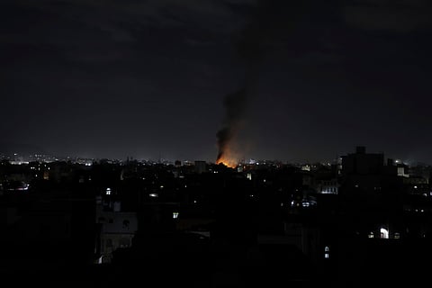 Smoke rises from a location reportedly struck by U.S. airstrikes in Sanaa, Yemen, Wednesday, March 19, 2025.