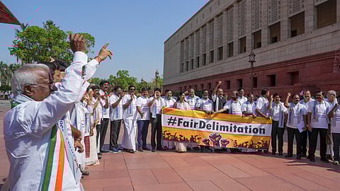 DMK MPs protest during the Budget session of Parliament, in New Delhi, Thursday, March 20, 2025.