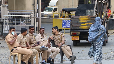 Security personnel deployed to maintain law and order, days after violence broke out following an agitation by a right-wing group demanding removal of Aurangzeb's tomb, at Hanspuri area in Nagpur.