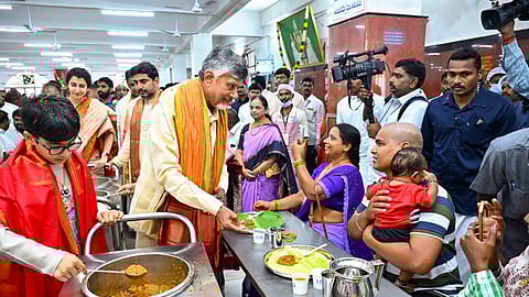Andhra Pradesh Chief Minister Nara Chandrababu Naidu along with his family members serves 'Anna Prasadam' to devotees at Vengamamba on the birthday of his grandson Nara Devansh, in Tirumala.