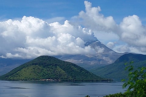 Mount Lewotobi Laki-Laki spews volcanic materials into the air in East Flores, Indonesia Friday, March 21, 2025.
