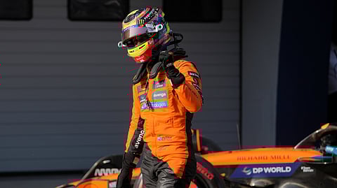McLaren driver Oscar Piastri of Australia celebrates his pole position after a qualifying session for the Chinese Formula One Grand Prix at the Shanghai International Circuit.