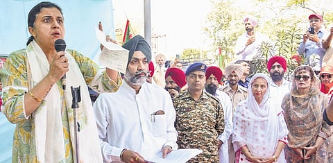 The family of Army Colonel Pushpinder Singh Bath holding a protest.