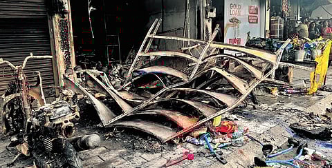 The shop that was gutted on Kathrikadavu Road on Saturday.