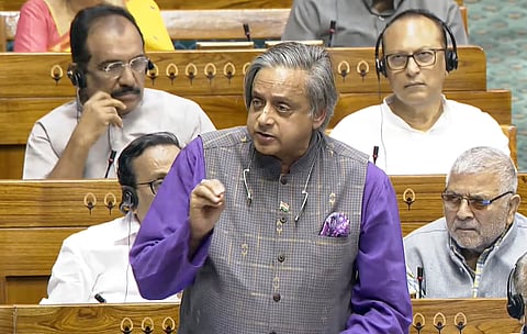 Congress MP Shashi Tharoor speaks in the Lok Sabha during the Budget session of Parliament, in New Delhi, Friday, March 21, 2025.