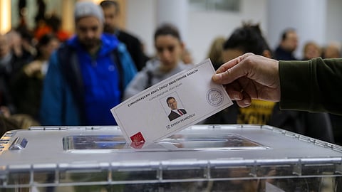 People cast their ballots in a Republican People's Party or (CHP) polling station during a symbolic election to show solidarity with Istanbul's Mayor Ekrem Imamoglu after he was arrested, in Istanbul, Turkey, Sunday, March 23, 2025.