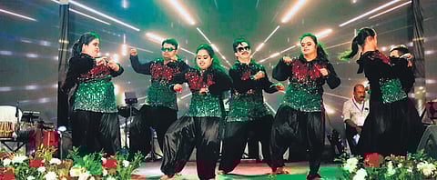Members of Anuyatra Rhythm perform during an event held in December