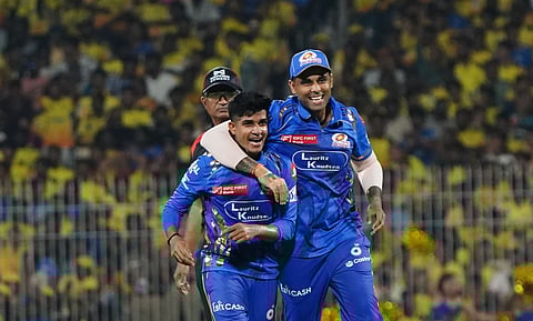 Vignesh Puthur celebrates a wicket against CSK on Sunday
