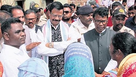 Ministers Suresh Pujari & KC Mahapatra listening to the affected people on Sunday.
