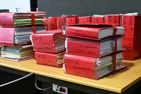 Court files arranged on the opening day of Le Scouarnec’s four-month trial.