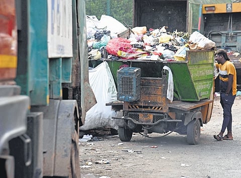 A garbage vehicle parked near St John’s Road junction in Bengaluru.