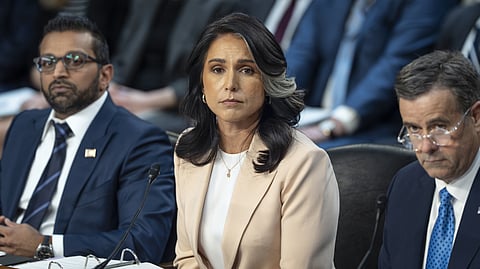 US Director of National Intelligence Tulsi Gabbard, center, is flanked by FBI Director Kash Patel, left, and CIA Director John Ratcliffe, as the Senate Intelligence Committee holds a hearing, on Capitol Hill in Washington, Tuesday, March 25, 2025.