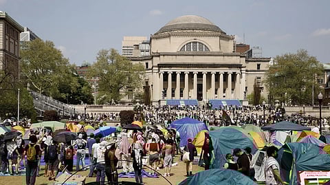 Student protesters gather inside their encampment on the Columbia University campus, April 29, 2024, in New York.