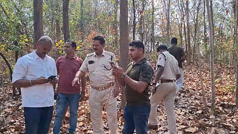 Police recreating the crime scene inside the forest at Burla.