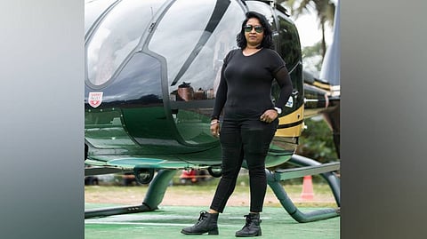 Anu Kunjumon, one among several women who are now breaking gender stereotypes by entering into the long-drawn male dominated profession of bouncers, poses for pictures, in Thiruvananthapuram.