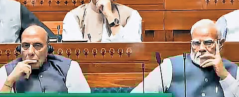 Prime Minister Narendra Modi and Defence Minister Rajnath Singh in the Lok Sabha during the Budget session of Parliament on Wednesday.