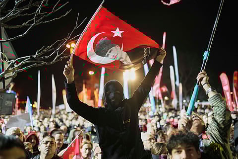 Protesters shout slogans during a protest after Istanbul's Mayor Ekrem Imamoglu was arrested and sent to prison, in Istanbul, Turkey, Tuesday, March 25, 2025.