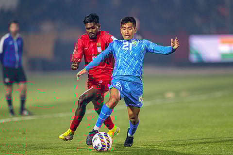 India's Boris Singh, right, and Bangladesh's Shariar Emon vie for the ball during the AFC Asian Cup qualifier football match between India and Bangladesh in Shillong (Photo | PTI)