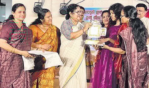 Higher Education Minister R Bindu honouring Ananya Bijesh, the recipient of Sarvshresth Divyangjan Award on Thursday
