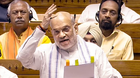Union Home Minister Amit Shah speaks in the Lok Sabha during the Budget session of Parliament, in New Delhi, Thursday, March 27, 2025.