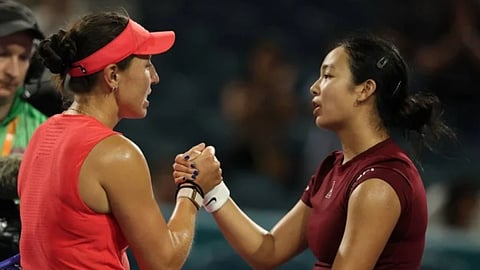 Jessica Pegula (L) meets Alexandra Eala of the Philippines at the net after defeating her during their match on Day 10 of the Miami Open at Hard Rock Stadium on March 27, 2025 in Miami Gardens, Florida.