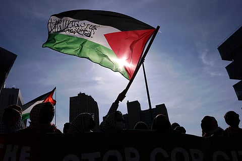 Protesters rally in support of detained Palestinian activist Mahmoud Khalil, March 14, 2025, in New York.