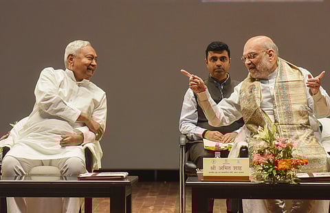 Union Home Minister Amit Shah along with Bihar Chief Minister Nitish Kumar at a state-level cooperative conference, in Patna, Sunday, March 30, 2025.