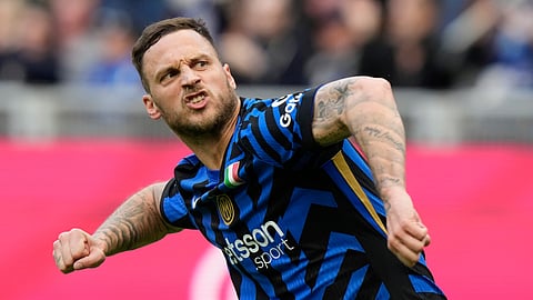 Inter Milan's Marko Arnautovic reacts after he scored during a Serie A soccer match between Inter Milan and Udinese at the San Siro stadium in Milan, Italy, Sunday, March 30, 2025.