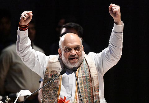 Union Home Minister Amit Shah addresses the gathering during a state level cooperative conference, in Patna, Sunday, March 30, 2025.