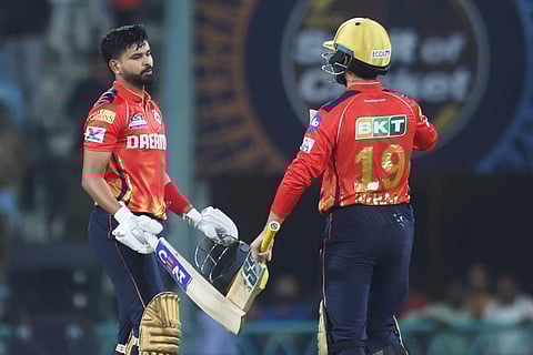 Punjab Kings captain Shreyas Iyer, left, and Nehal Wadhera celebrate their team's victory in the Indian Premier League match against Lucknow Super Giants (Photo | AP)
