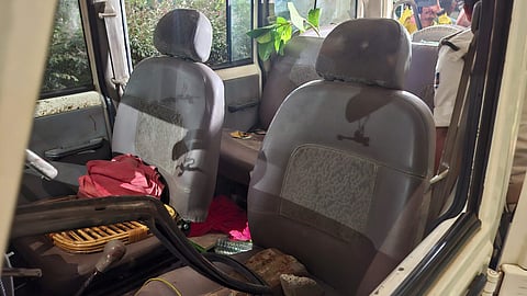 The vandalised police vehicle.