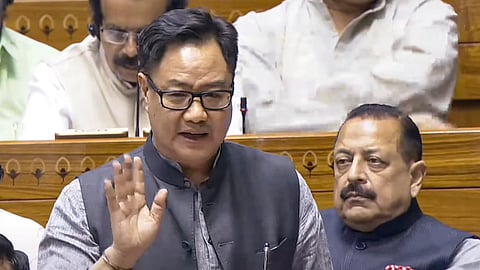 Union Minister of Minority Affairs Kiren Rijiju speaks in the Lok Sabha during the Budget session of Parliament, in New Delhi, Wednesday, April 2, 2025.