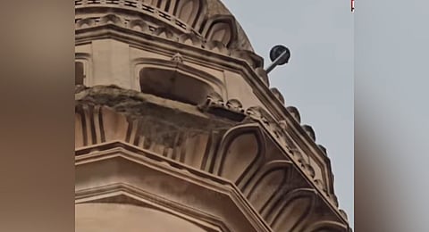 A view of the damaged south-eastern minaret of the Charminar in Hyderabad from where a chunk of lime plaster fell off following heavy rains on Thursday