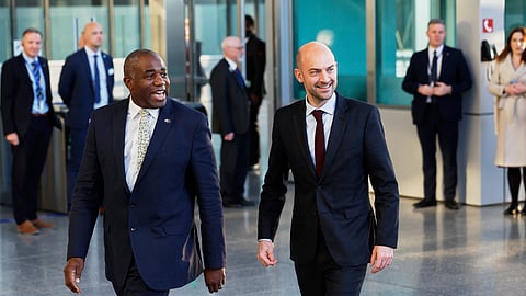 Britain's Foreign Secretary David Lammy, left, and French Foreign Minister Jean-Noel Barrot arrive to address the media during a meeting of NATO foreign ministers at NATO headquarters in Brussels, Friday, April 4, 2025.