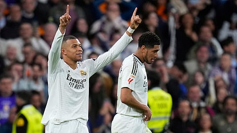 Real Madrid's Kylian Mbappe celebrates after scoring during a Spanish La Liga football match between Real Madrid and Leganes at the Santiago Bernabeu stadium in Madrid, Spain, Saturday, March 29, 2025.