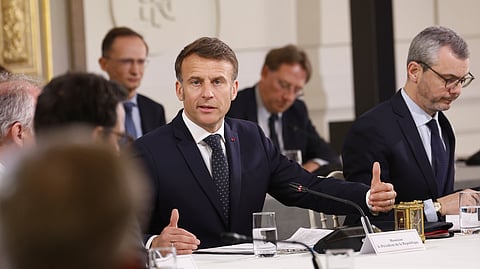 French President Emmanuel Macron speaks during a meeting with representatives of the sectors affected by new tariffs announced by President Donald Trump, Thursday, April 3, 2025, at the Elysee Palace in Paris.