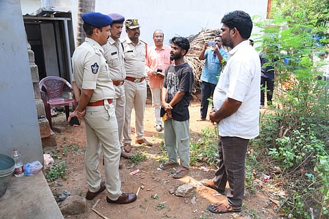 Garividi police collecting evidence with the help of clues team and dog squad at the incident spot, where 18-year-old girl attacked by unknown miscreants in Sivaram village.