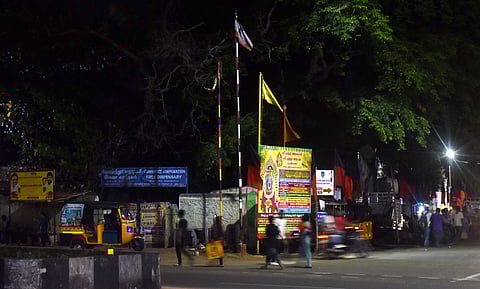 Flagpoles at 80 feet road junction at Olympus in Coimbatore on Sunday.