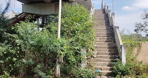 A picture of a pedestrian overpass in Morappur railway station which has faced severe neglect.