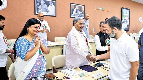 Chief Minister Siddaramaiah greets Leader of Opposition in Lok Sabha Rahul Gandhi at the AICC meeting in Ahmedabad, Gujarat, on Tuesday