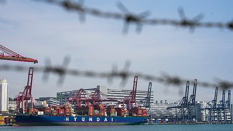 A container ship is docked at Kwai Chung Container Terminal in Hong Kong on Tuesday, Apr. 8, 2025.